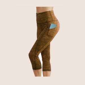 CodeFit Capri Power Flex Dry-Fit Leggings with Pockets in Heathered Orange